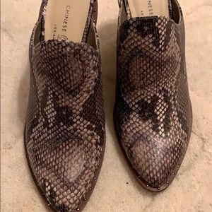 Snakeskin slip on mules